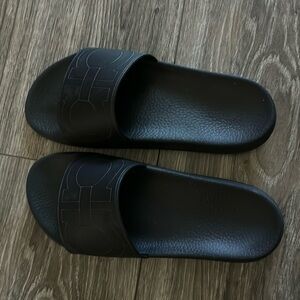 Black on black etched logo size 8 Salvatore Ferragamo slides